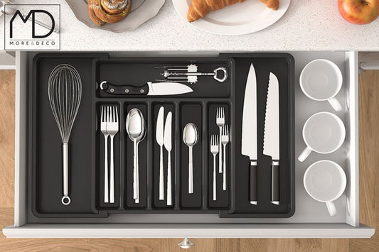 Black expandable cutlery drawer organizer with divided utensil compartments